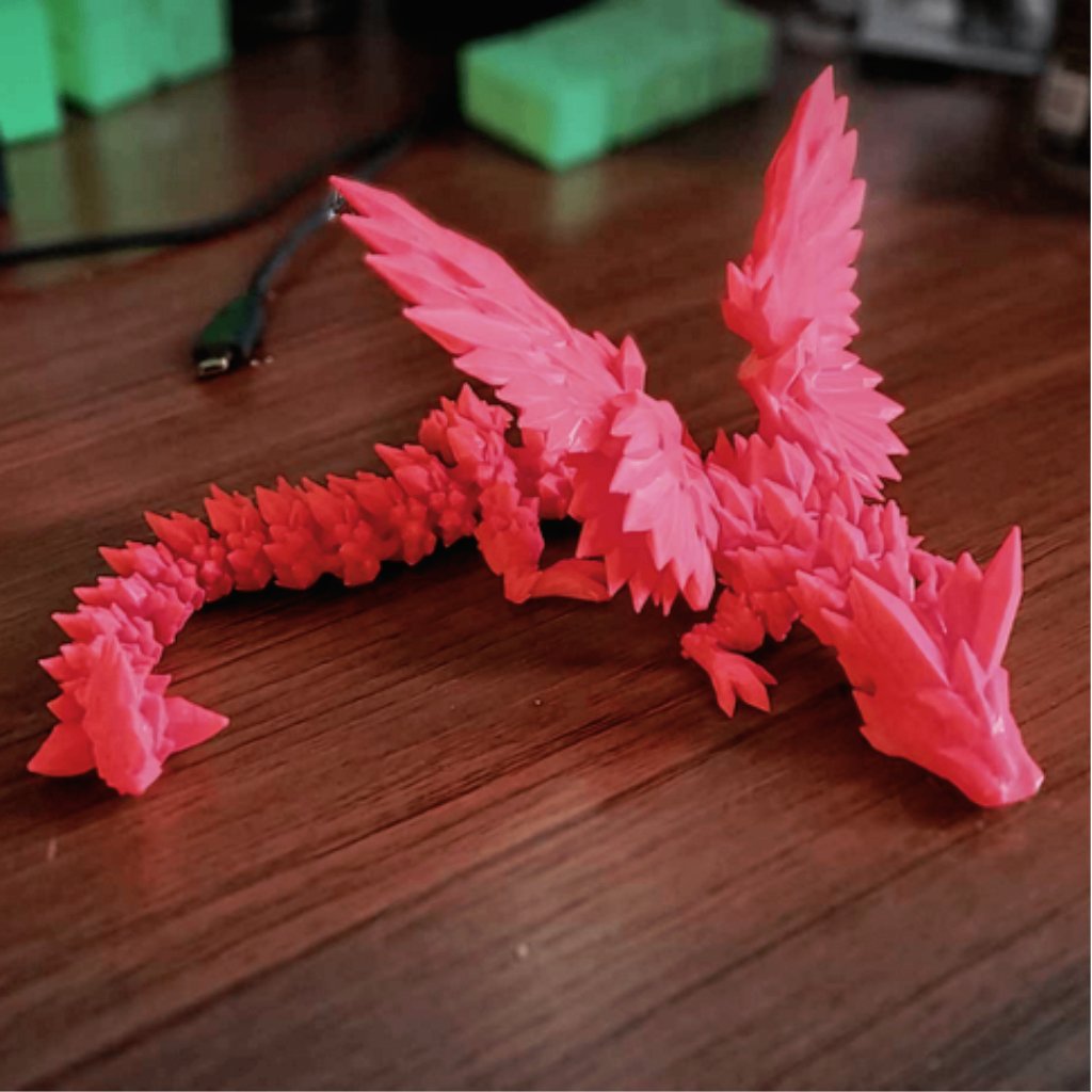 Vibrant 12 in Crystal Winged Dragon Sculpture, a stunning fantasy decor piece for enchanting interiors.