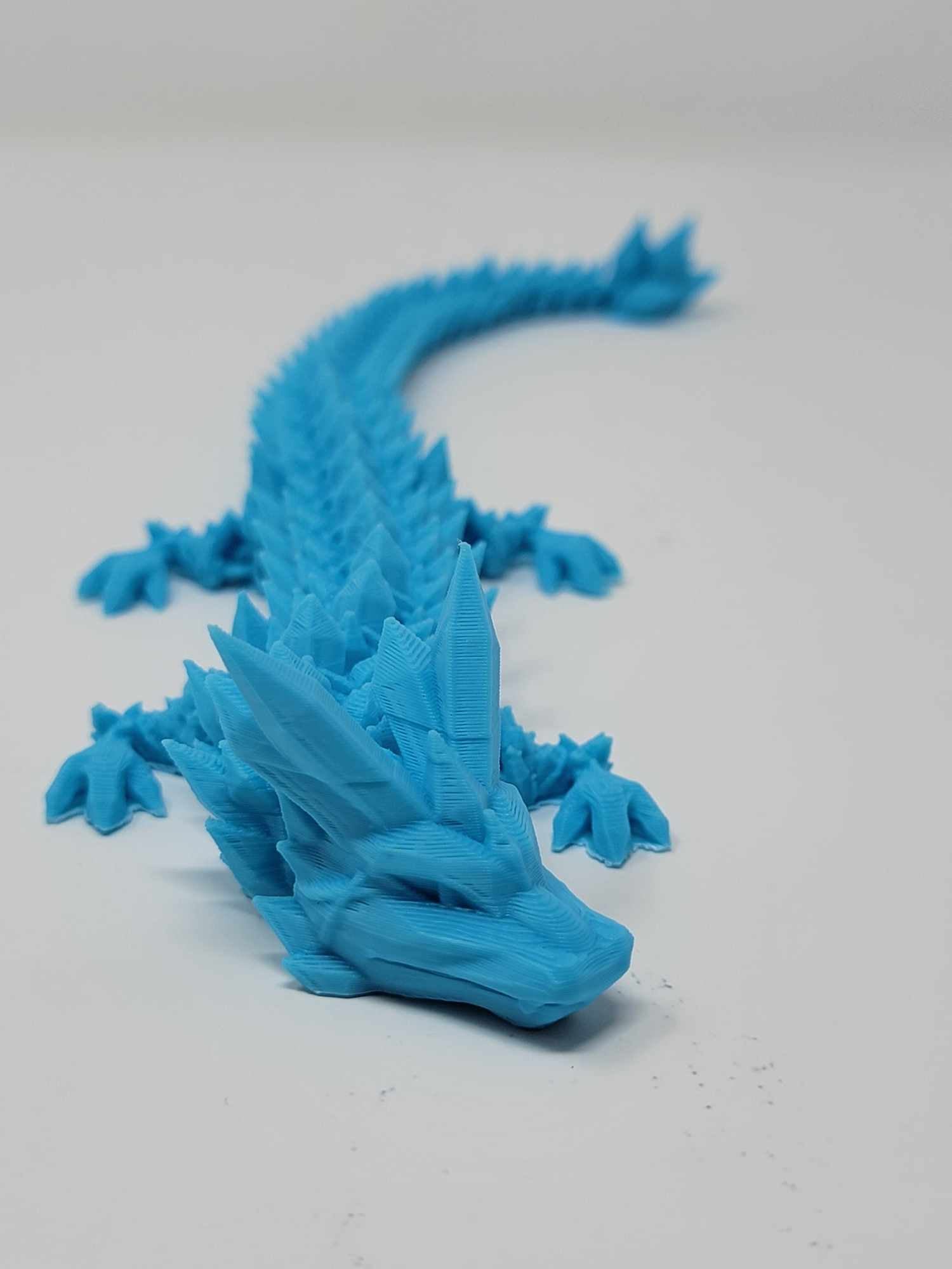 Majestic 12 in Crystal Winged Dragon Sculpture, a stunning fantasy artwork perfect for any collection.